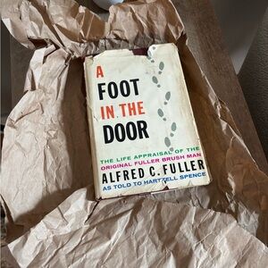 Signed First Edition of A Foot in the Door Hardcover Book